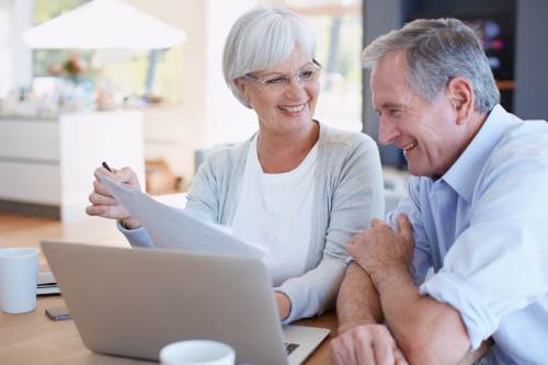 Mature couple discussing finances