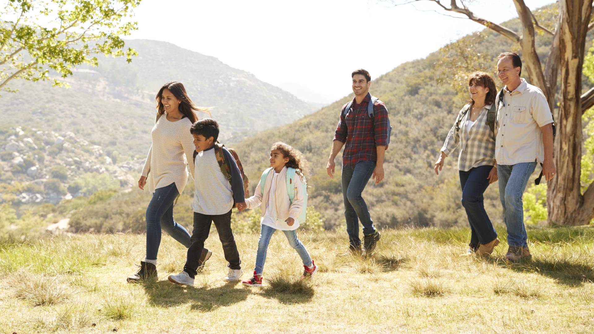 Multi-generational family hiking together